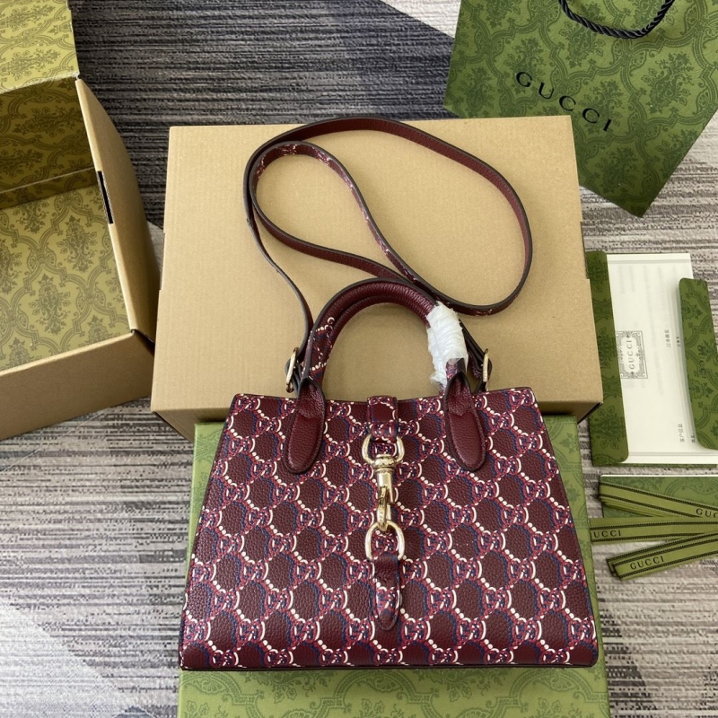 G*u*i top handle bags